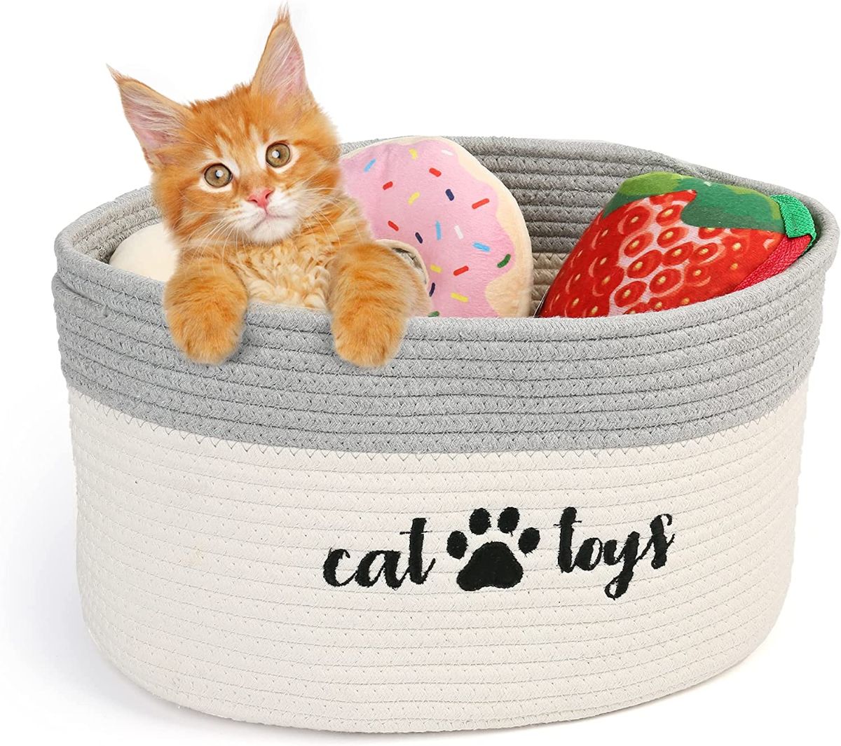 A cat basket with toys.